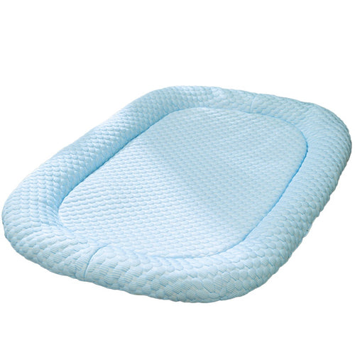 Close-up view of breathable fabric on a supportive cooling pet mat.
