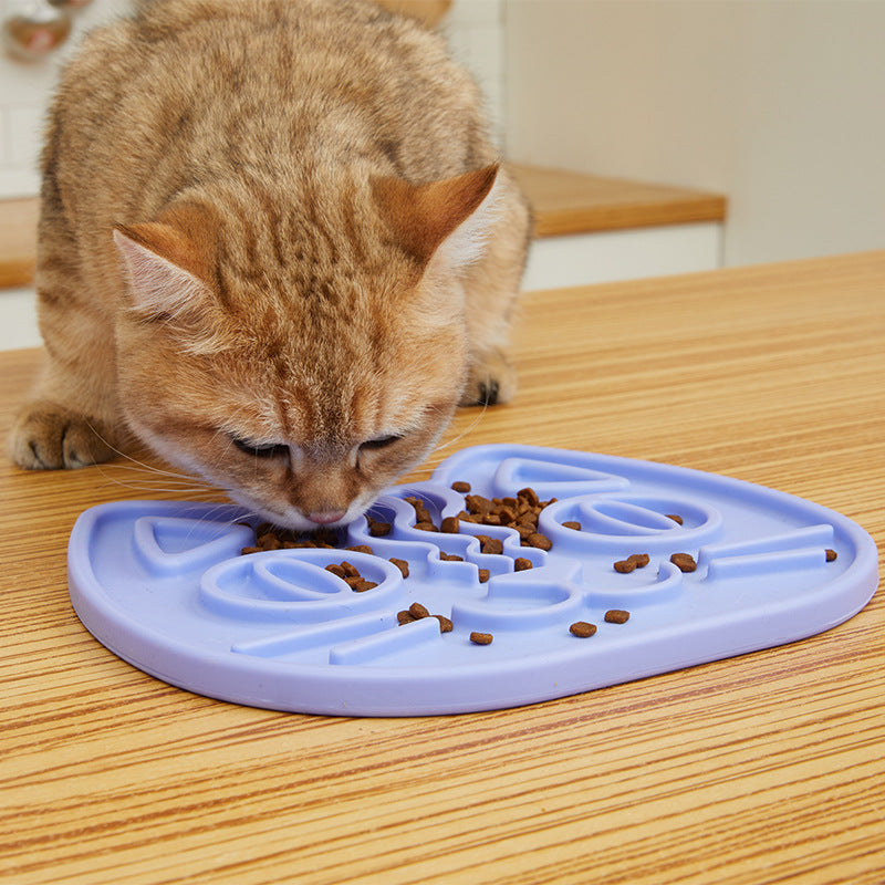 PawLick™ food-grade silicone lick mat shown with a pet enjoying slow feeding