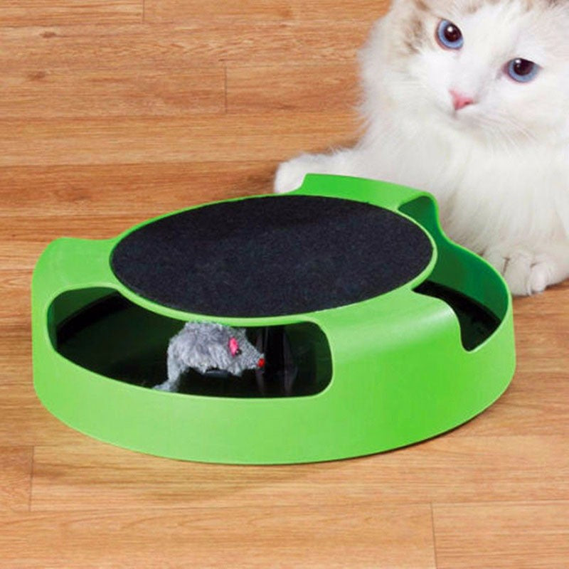 Cat playing with PawSpin interactive mouse chase toy