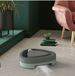 PawSpin™ Smart Interactive Cat Scratcher Toy placed on the floor for indoor cat play.